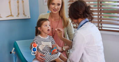 a dr checking a child